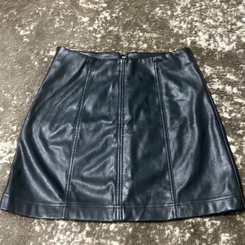 Black leather skirt. Never worn. Good shape, it just dose not fit me.